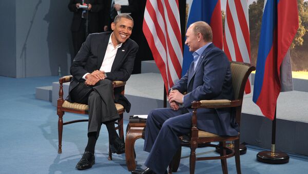 Predsednik Rusije Vladimir Putin (D) i predsednik SAD Barak Obama - Sputnik Srbija