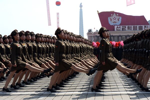 North Korean female soldiers march during a military parade to mark 100 years since the birth of the country's founder Kim Il-Sung in Pyongyang on April 15, 2012 - Sputnik Србија