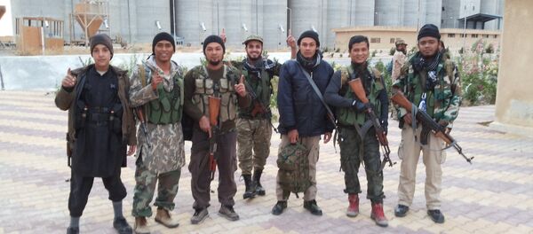 Слика припадника терористичке организације ДАЕШ Слика припадника терористичке организације ДАЕШ - Sputnik Србија