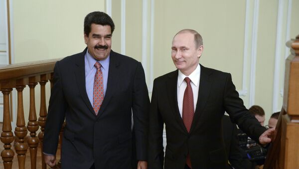 Predsednik Rusije Vladimir Putin i predsednik Venecuele Nikolas Maduro - Sputnik Srbija