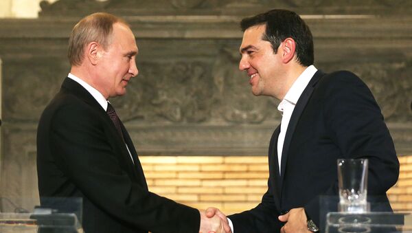 Predsednik Rusije Vladimir Putin i premijer Grčke Aleksis Cipras tokom sastanka u Atini. - Sputnik Srbija