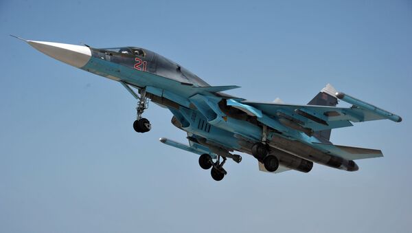 Mnogofunkcionalьnый istrebitelь-bombardirovщik VKS RF Su-34 na aviabaze Hmeйmim v Sirii - Sputnik Srbija
