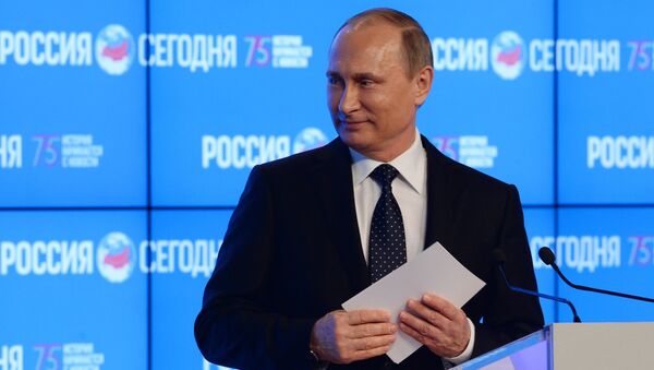 Vladimir Putin u poseti Rusija sevodnja - Sputnik Srbija