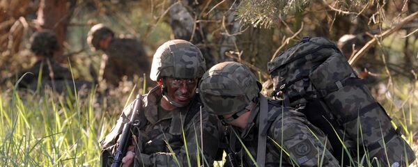 Пољски и британски војници током НАТО војне вежбе - Sputnik Србија