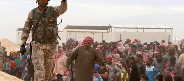 Јордански војник у сиријском избегличком кампу - Sputnik Србија