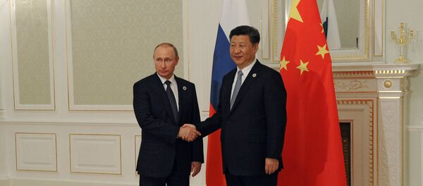 Председник Русије Владимир Путин и председник Кине Си Ђинпинг - Sputnik Србија