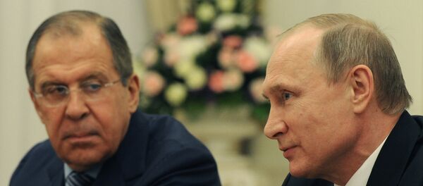 Председник Руске Федерације Владимир Путин са министром иностраних послова Сергејем Лавровом - Sputnik Србија