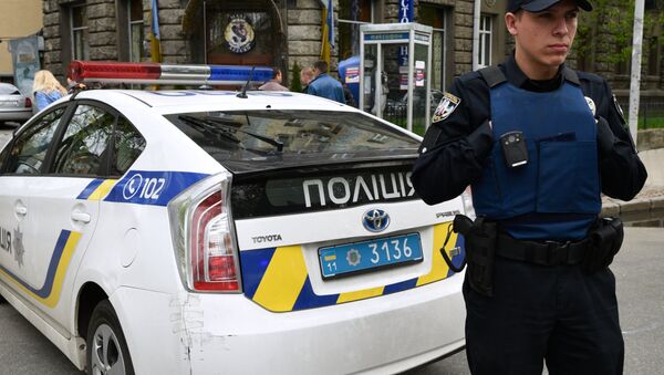 Украјински полицајац у Кијеву - Sputnik Србија