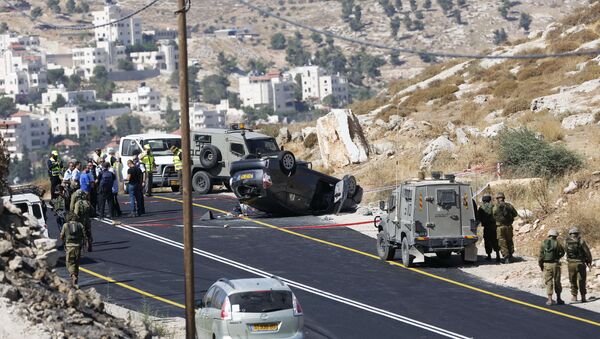 Izraelski vojnici obezbeđuju mesto napada u blizini Hebrona - Sputnik Srbija