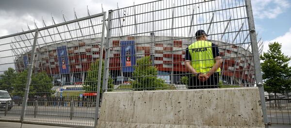 Пољски полицајци испред ПГЕ Националног стадиона, на ком се одржава Самит НАТО-а. Варшава, Пољска. - Sputnik Србија