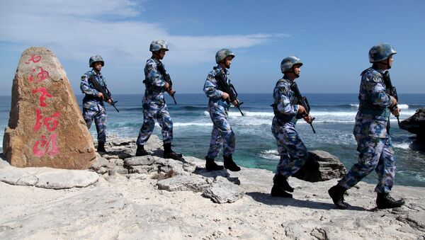 Vojnici Narodnooslobodilačke vojske Kine patroliraju ostrvom u Paracelskom arhipelagu - Sputnik Srbija