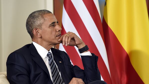Амерички председник Барак Обама током састанка са в.д. премијера Шпаније Маријаном Рахојем у Мадриду. - Sputnik Србија