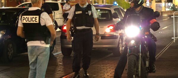 Француски полицајци у Ници после терористичког напада 14. јула Француски полицајци у Ници после терористичког напада 14. јула - Sputnik Србија