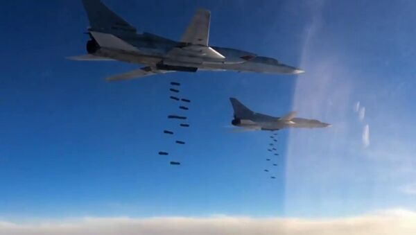 A Tupolev Tu-22M3 long-range strategic and maritime strike bomber of the Russian Aerospace Forces during a combat flight to strike the Islamic State infrastructure facilities in Syria by OFAB-25-270 fragmentation high explosive bombs - Sputnik Србија