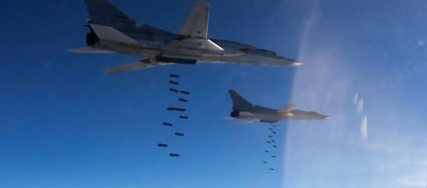 A Tupolev Tu-22M3 long-range strategic and maritime strike bomber of the Russian Aerospace Forces during a combat flight to strike the Islamic State infrastructure facilities in Syria by OFAB-25-270 fragmentation high explosive bombs - Sputnik Србија