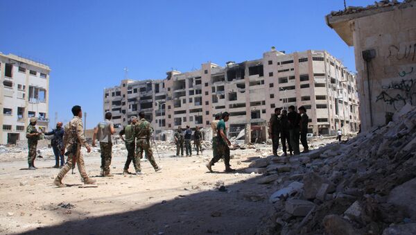 Patrola sirijske armije kod ulaza u Vani Zeid u oblasti Leramun na severozapadu Alepa. - Sputnik Srbija
