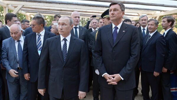Председник Русије Владимир Путин и председник Словеније Борут Пахор - Sputnik Србија