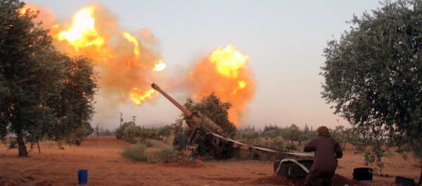 Opposition fighters, belonging to Ajnad Al-Sham, fire shells from their position in Aleppo's southern countryside (File) - Sputnik Србија