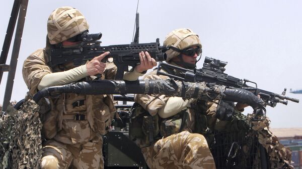 British soldiers stand guard at Umm Qasr port in Basra, Iraq - Sputnik Srbija