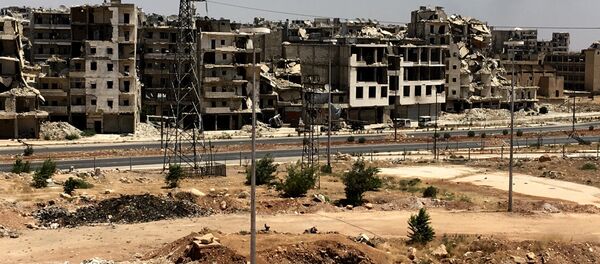 Oštećene zgrade u okrugu Ramuseh u Alepu. Oštećene zgrade u okrugu Ramuseh u Alepu. - Sputnik Srbija