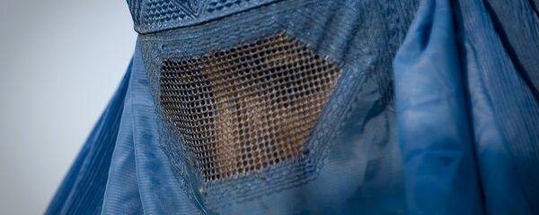 Žena sa burkom Žena sa burkom - Sputnik Srbija