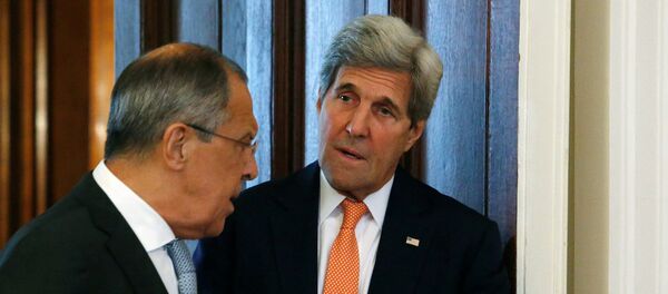 Министар иностраних послова Русије Сергеј Лавров и његов амерички колега Џон Кери - Sputnik Србија
