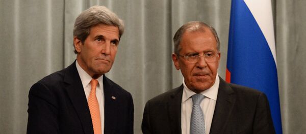 Шеф руске дипломатије Сергеј Лавров и амерички државни секретар Џон Кери - Sputnik Србија