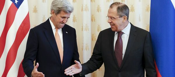 Шеф руске дипломатије Сергеј Лавров и амерички државни секретар Џон Кери - Sputnik Србија