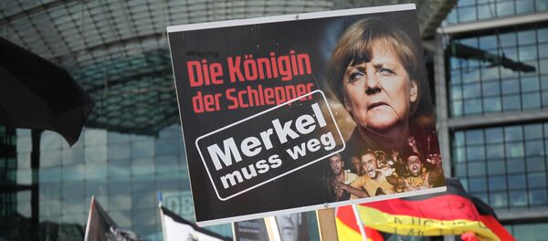 Демонстрације против политике Ангеле Меркел у Берлину - Sputnik Србија
