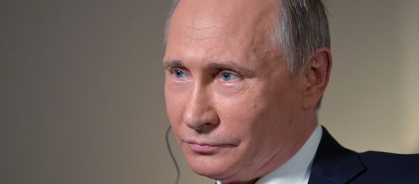 Председник Русије Владимир Путин током интервјуа у Владивостоку - Sputnik Србија