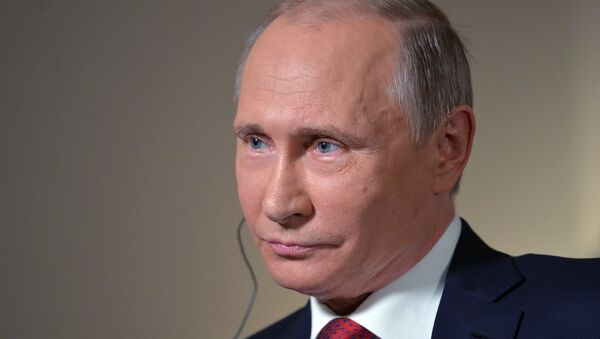Председник Русије Владимир Путин током интервјуа у Владивостоку - Sputnik Србија