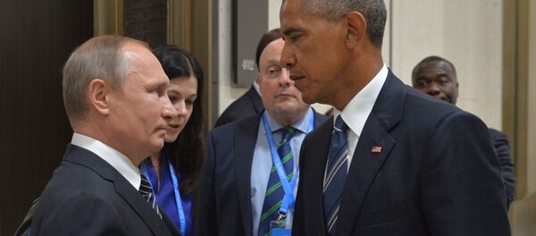 Председник Русије Владимир Путин и председник САД Барк Обама - Sputnik Србија