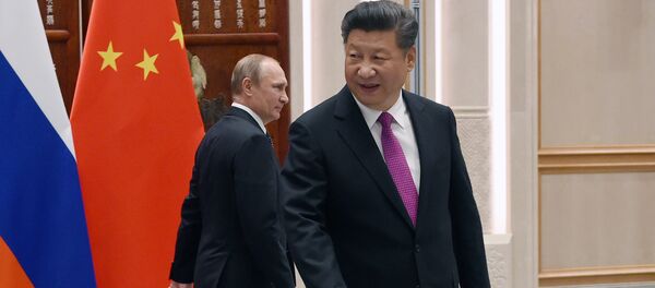 Владимир Путин и Си Ђинпинг Владимир Путин и Си Ђинпинг - Sputnik Србија