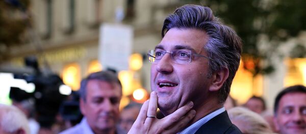 Андреј Пленковић на гласању Андреј Пленковић на гласању - Sputnik Србија