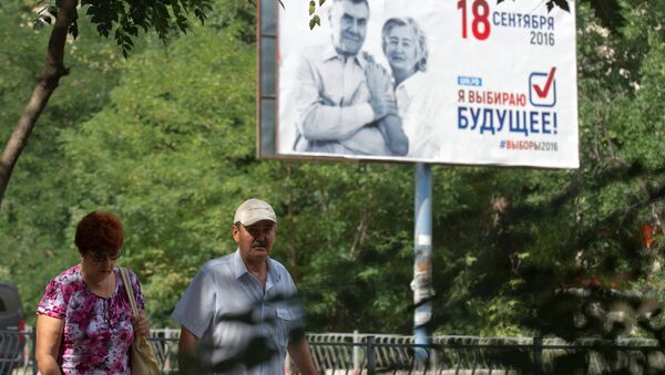 Предизборни плакат у Симферопољу пред изборе за Државну думу Русије - Sputnik Србија