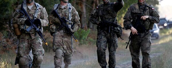 Војници Пољске и САД током војне вежбе НАТО-а у Пољској Војници Пољске и САД током војне вежбе НАТО-а у Пољској - Sputnik Србија