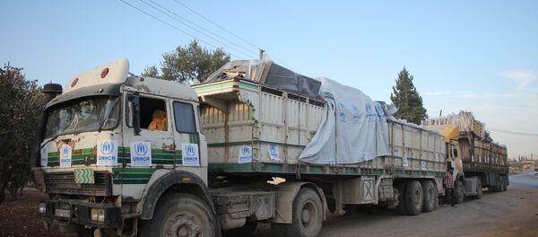 Конвој хуманитарне помоћи северно од Алепа Конвој хуманитарне помоћи северно од Алепа - Sputnik Србија