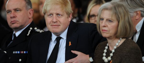 Борис Џонсон и Тереза Меј. - Sputnik Србија