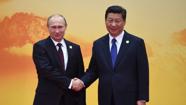Председник Русије Владимир Путин и председник Кине Си Ђинпинг на састанку Азијско-пацифичке економске сарадње - Sputnik Србија