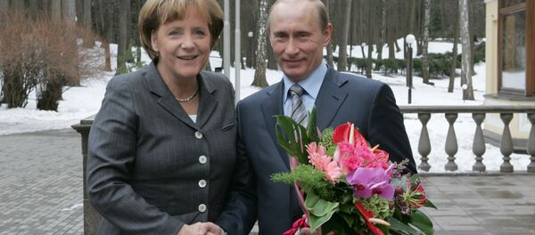 Vladimir Putin i Angela Merkel Vladimir Putin i Angela Merkel - Sputnik Srbija