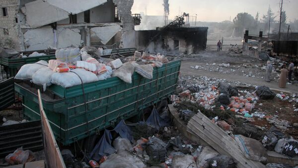 Ostaci humanitarnog konvoja pogođenog u vazdušnom napadu u blizini sirijskog Alepa - Sputnik Srbija
