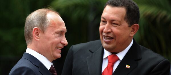 Predsednik Rusije Vladimir Putin i nekadašnji predsednik Venecuele Ugo Čaves tokom sastanka u Karakasu - Sputnik Srbija