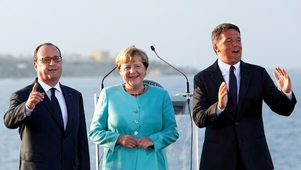 Francuski predsednik Fransoa Oland, nemačka kancelarka Angela Merkel i italijanski premijer Mateo Renci - Sputnik Srbija
