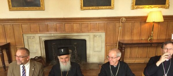 Patrijarh Irinej i  arhiepiskop kenterberijski Džastin Velbi - Sputnik Srbija