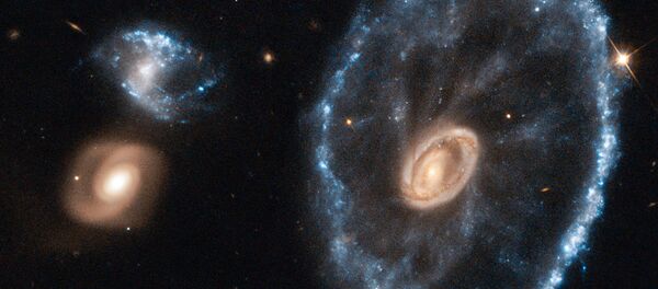 Изображение далекой галактики под названием Колесо телеги (Cartwheel Galaxy), сделанное с помощью космического телескопа НАСА Hubble - Sputnik Србија