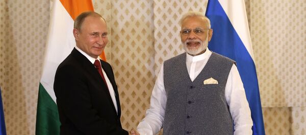 Председник Русије Владимир Путин и премијер Индије Нарендра Моди пре састанка у оквиру самита БРИКС-а - Sputnik Србија