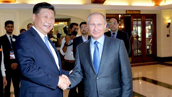 Председник Кине Си Ђинпинг и председник Русије Владимир Путин на самиту БРИКС-а у Индији - Sputnik Србија