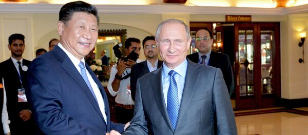Председник Кине Си Ђинпинг и председник Русије Владимир Путин на самиту БРИКС-а у Индији - Sputnik Србија