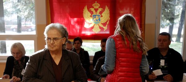 Birači na glasanju u Podgorici Birači na glasanju u Podgorici - Sputnik Srbija