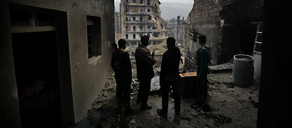 Kurdska oružana jedinica nadgleda opkoljeni okrug Karmel el Džabl u istočnom Alepu Kurdska oružana jedinica nadgleda opkoljeni okrug Karmel el Džabl u istočnom Alepu - Sputnik Srbija